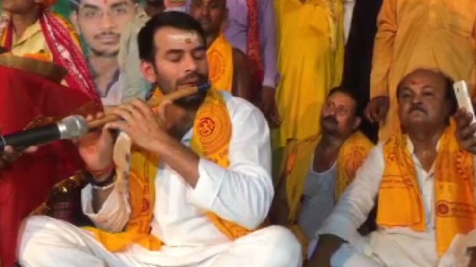 Tej Pratap Yadav Seen In Religious Avatar Playing Flute And Reading