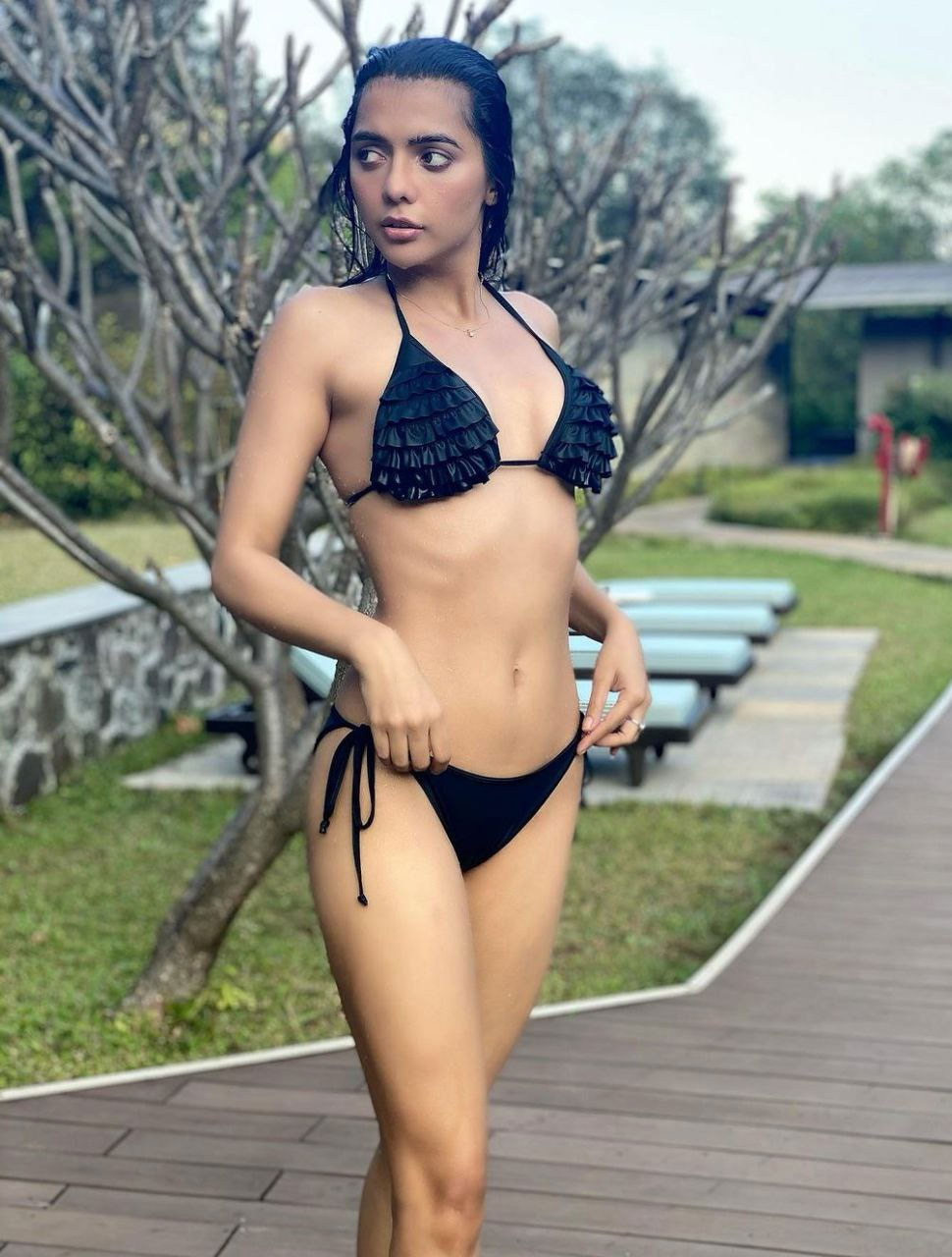 Ruhi Singh Flaunts Her Bikini Body As She Poses By A Pool