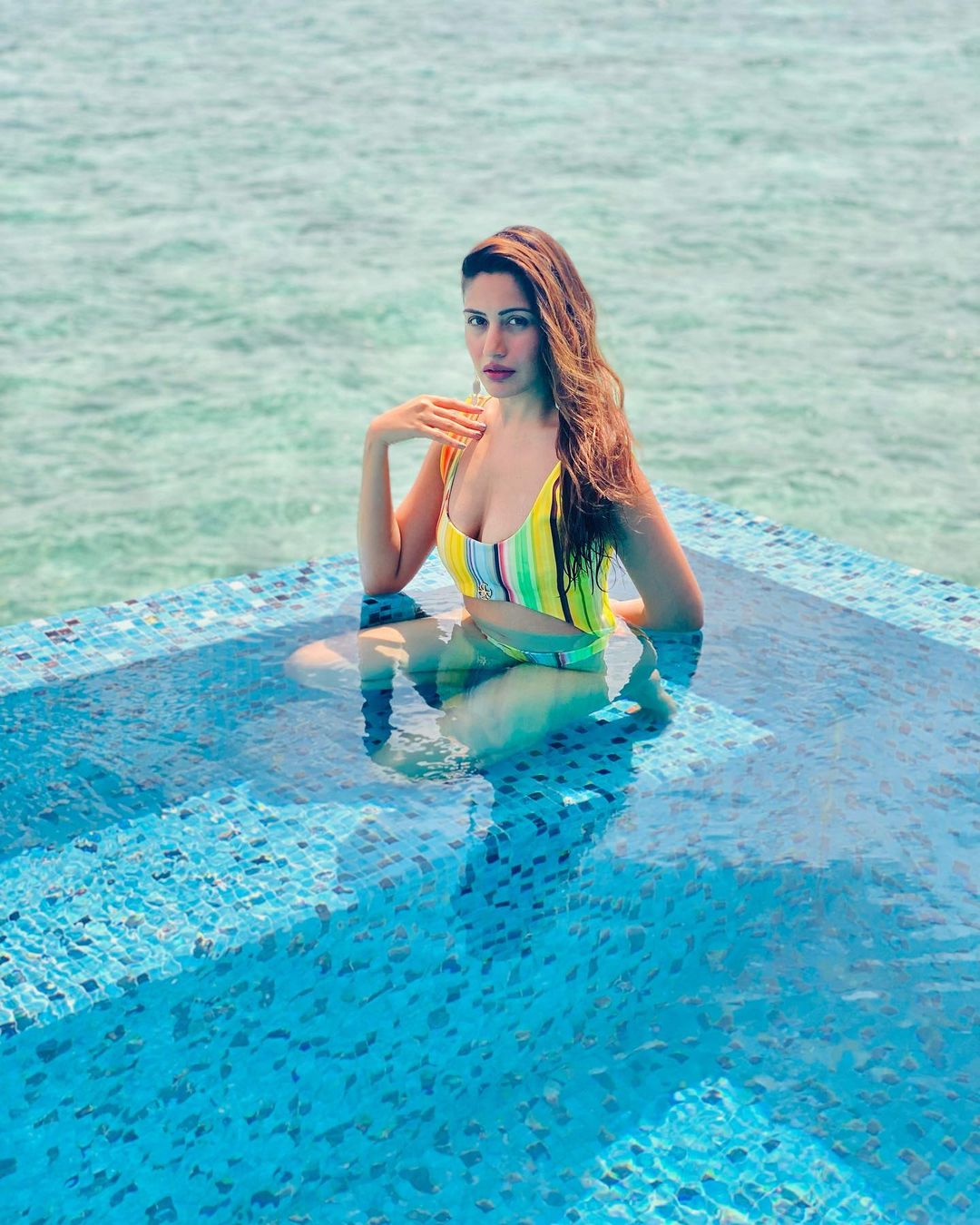 Surbhi Chandna Shares Photos In Super Bold Stripped Bikini As She Takes Dip In The Ocean In