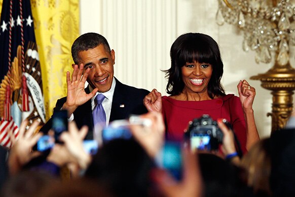 वाशिंगटन हाउस में अमेरिकी राष्ट्रपति बराक ओबामा और उनकी पत्नी मिशेल ओबामा।