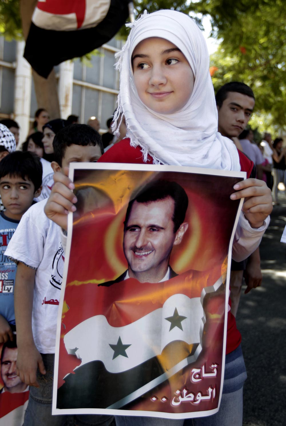 बेरूत में सीरियाई राष्ट्रपति बशर अल असद की एक प्रशंसक।