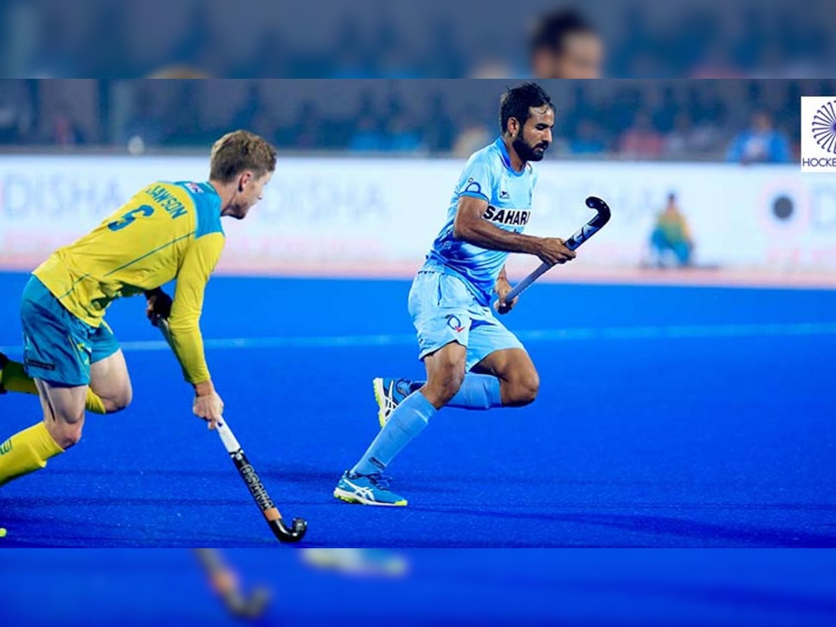 मैच के दौरान एक्शन में भारत और ऑस्ट्रेलिया के खिलाड़ी. (Hockey India/Twitter/1 Dec, 2017)