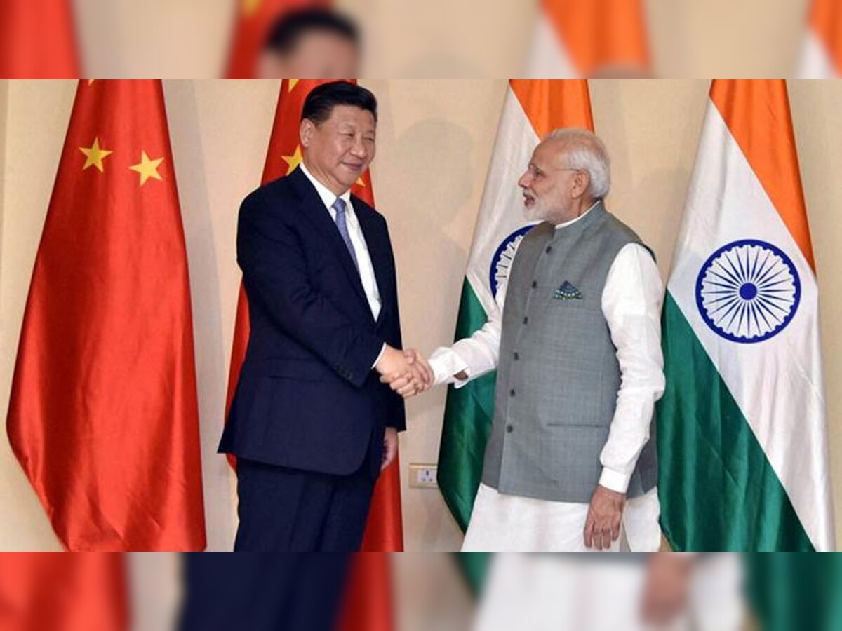 एक मुलाकात के दौरान चीन के राष्ट्रपति शी जिनपिंग और भारत के प्रधानमंत्री नरेंद्र मोदी. (फाइल फोटो)