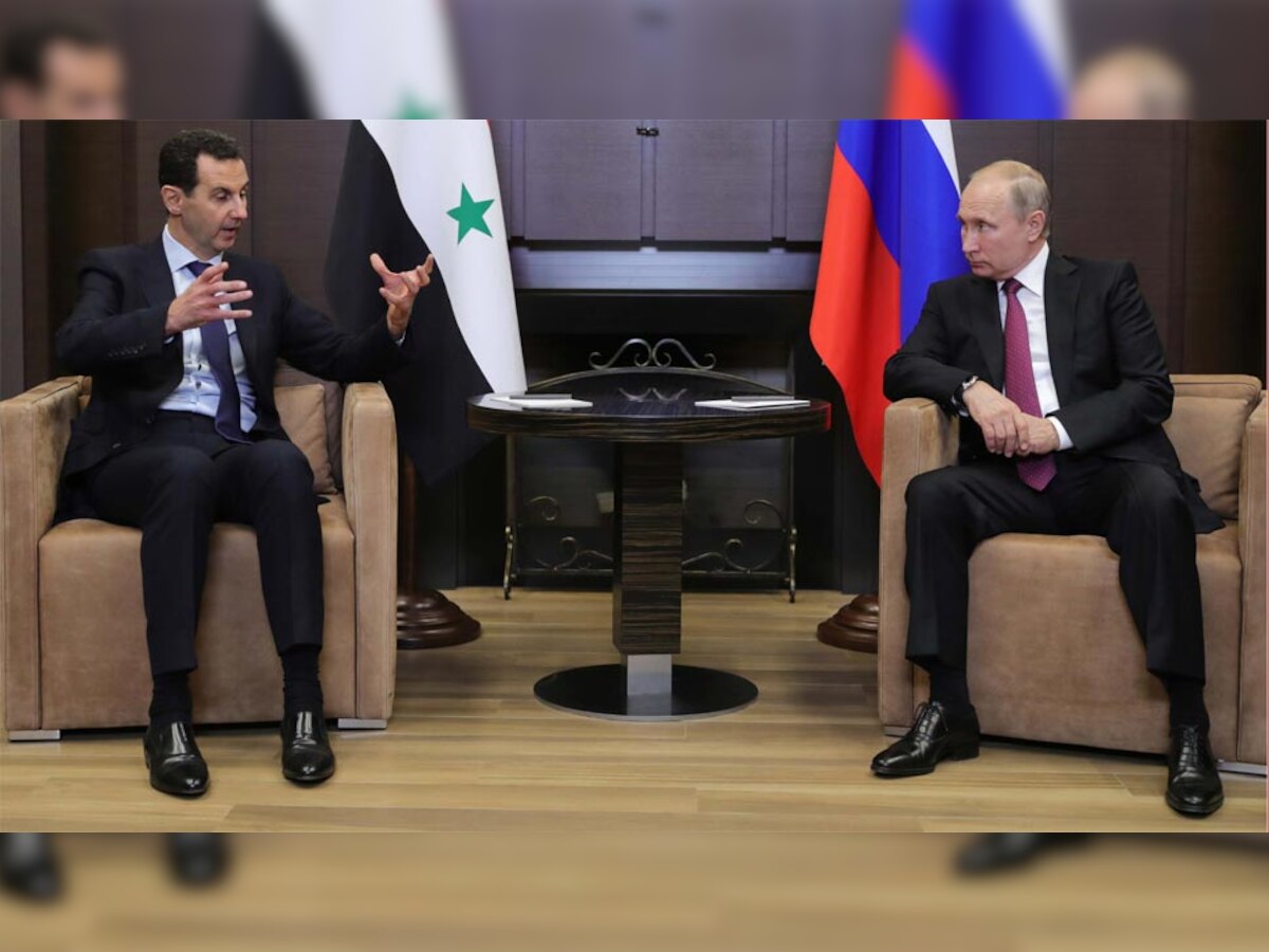 सोची में मुलाकात के दौरान रूसी राष्ट्रपति व्लादिमीर पुतिन और सीरियाई नेता बशर अल-असद. (Reuters/ 18 May, 2018)