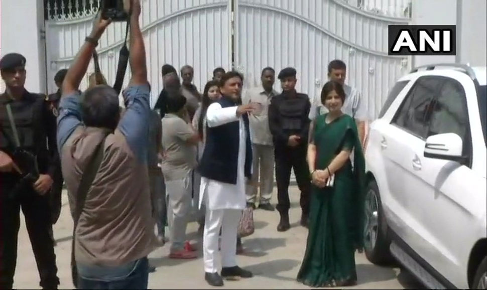 Akhliesh yadav and dimple yadav leaving government bang low