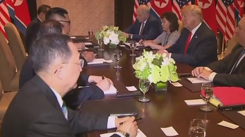 U.S. President Donald Trump sits next to North Korea''s leader Kim Jong Un U.S. President Donald Trump sits next to North Korea''s leader Kim Jong Un