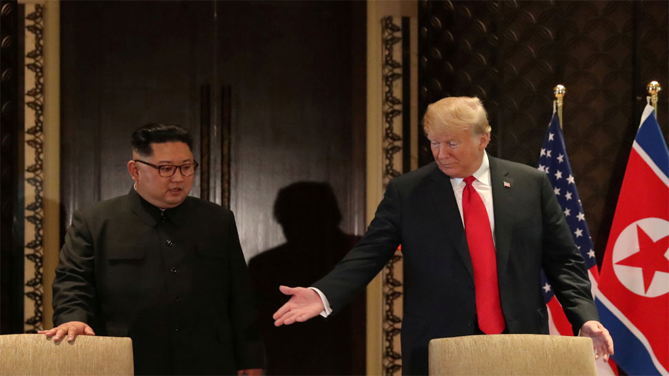 Donald Trump walks with North Korean leader Kim Jong Un-2 Donald Trump walks with North Korean leader Kim Jong Un-2