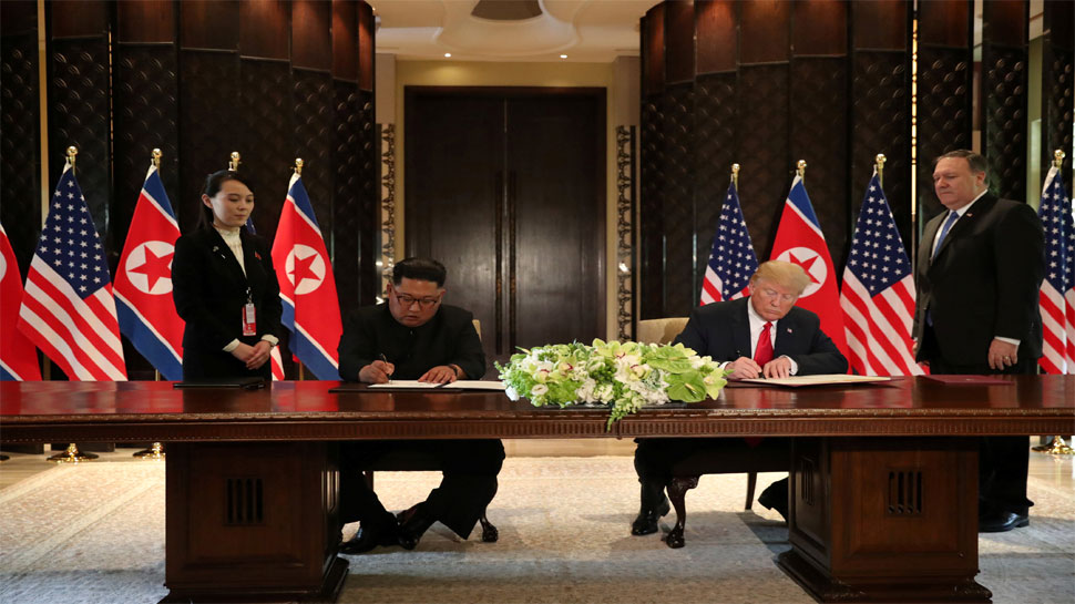 Donald Trump walks with North Korean leader Kim Jong Un Donald Trump walks with North Korean leader Kim Jong Un