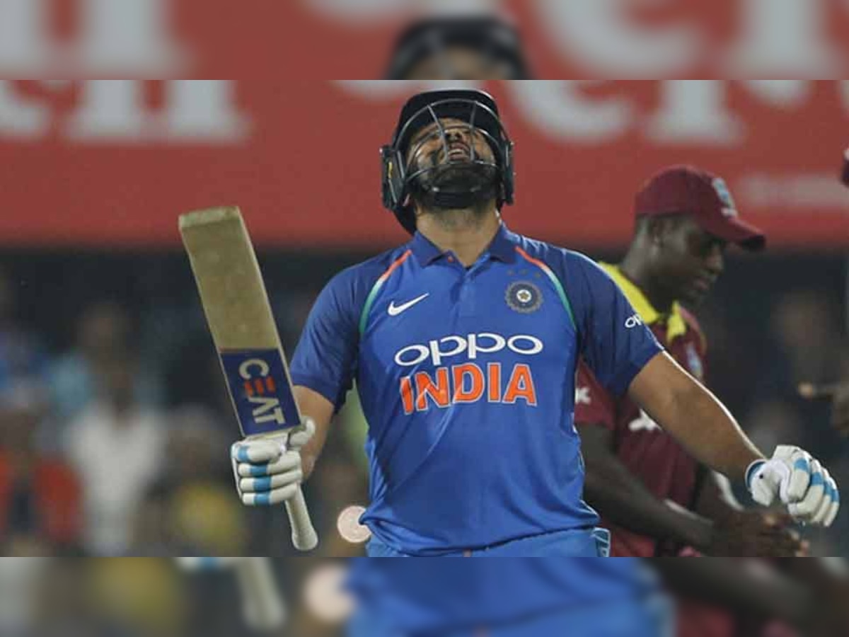 रोहित शर्मा ने वेस्टइंडीज के खिलाफ गुवाहाटी में खेले गए पहले वनडे मैच में 84 गेंद पर शतक पूरा किया. उन्होंने अपनी पारी में 8 छक्के जमाए. (फोटो: IANS) 