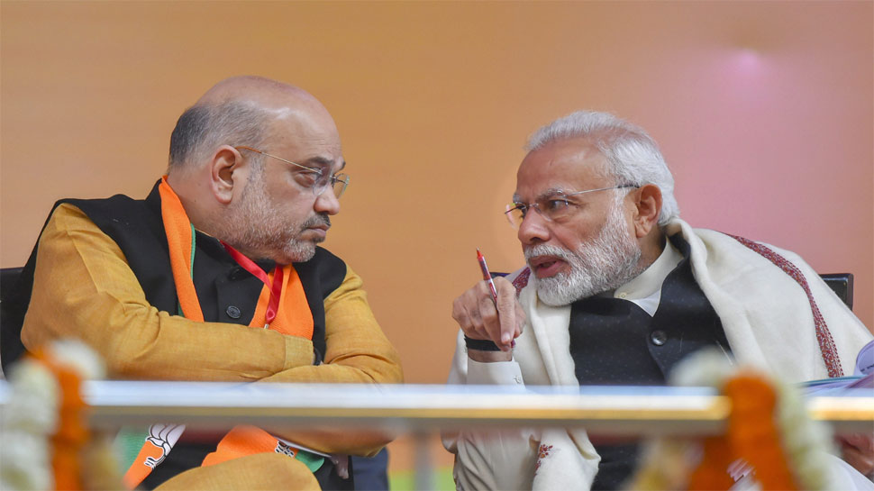 बीजेपी के राष्ट्रीय अधिवेशन के दौरान अमित शाह और पीएम नरेंद्र मोदी (फोटो साभार - PTI) बीजेपी के राष्ट्रीय अधिवेशन के दौरान अमित शाह और पीएम नरेंद्र मोदी (फोटो साभार - PTI)