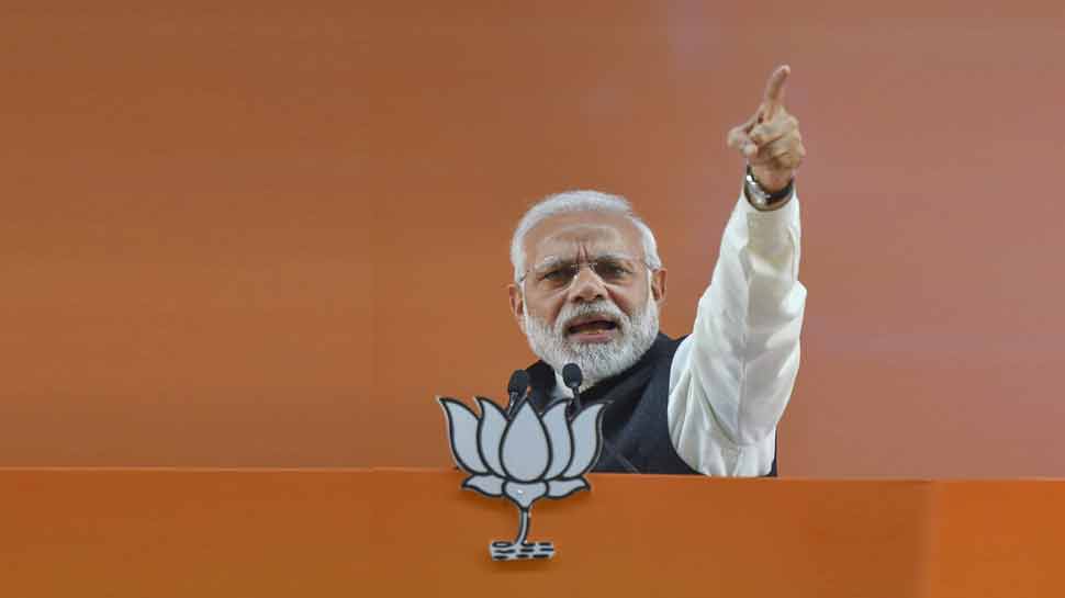 प्रधानमंत्री नरेंद्र मोदी ने बताया देश को कैसा प्रधानसेवक चुनना चाहिए. तस्वीर साभार: PTI प्रधानमंत्री नरेंद्र मोदी ने बताया देश को कैसा प्रधानसेवक चुनना चाहिए. तस्वीर साभार: PTI