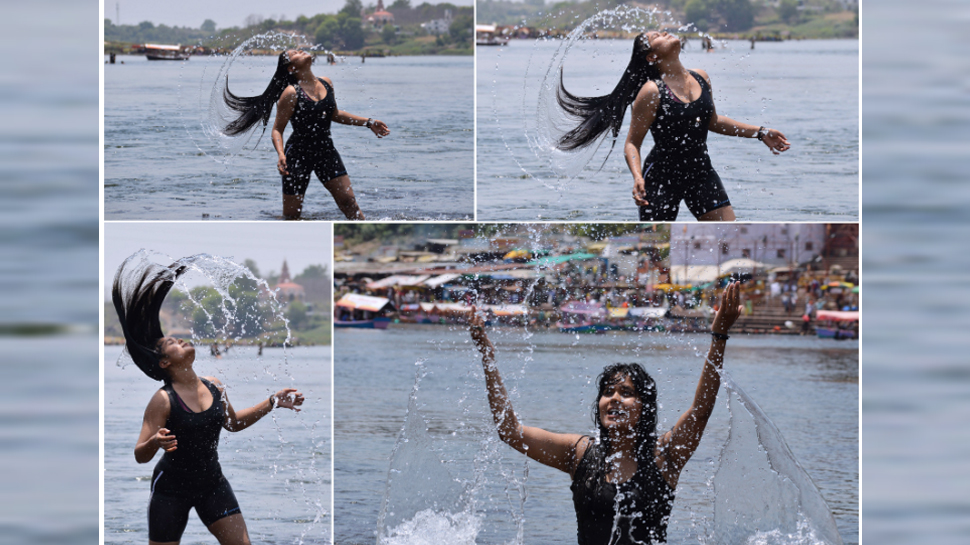 दिल्ली-NCR ही नहीं मध्य प्रदेश में भी भीषण गर्मी है. गर्मी से परेशान लोग नर्मदा में स्नान करने पहुंच रहे हैं. तस्वीर साभार: ANI दिल्ली-NCR ही नहीं मध्य प्रदेश में भी भीषण गर्मी है. गर्मी से परेशान लोग नर्मदा में स्नान करने पहुंच रहे हैं. तस्वीर साभार: ANI