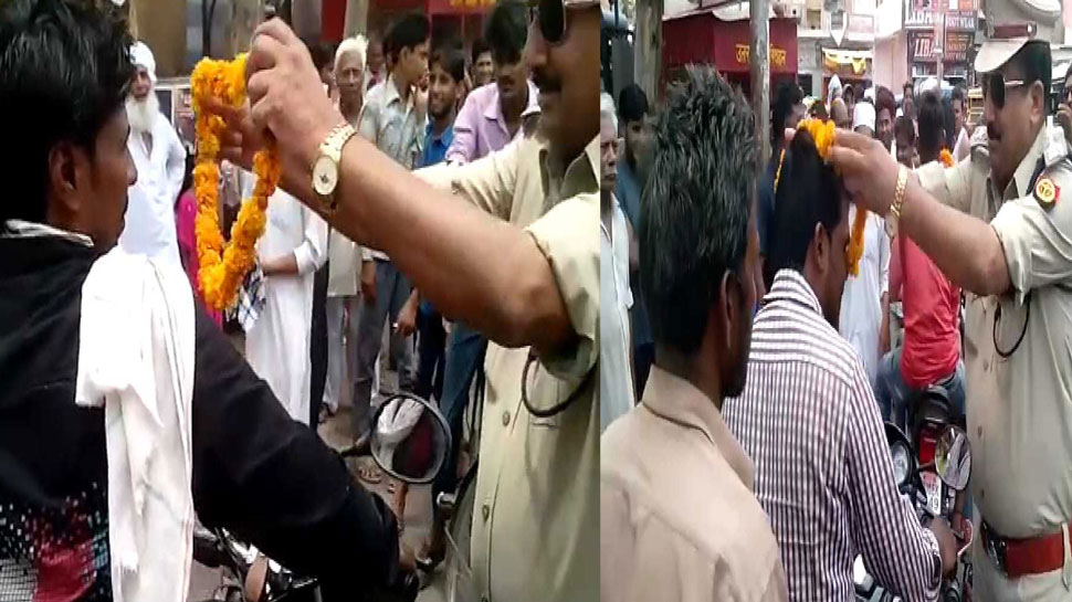 इस जिले में चला अनोखा चेकिंग अभियान, जो दिखा बिना हेलमेट, पहनाई गई फूलों की माला
