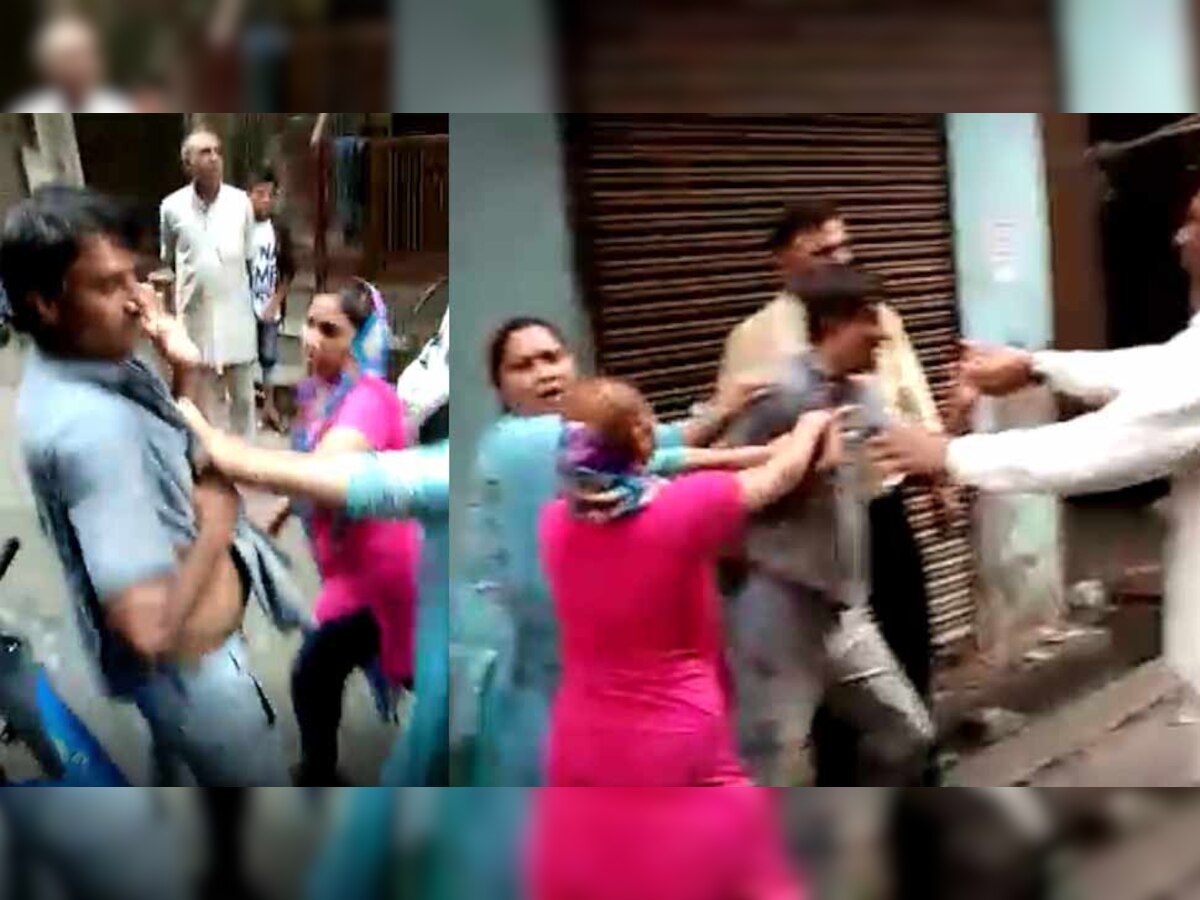 VIDEO: दिल्ली में अवैध शराब पकड़ने गई टीम को महिलाओं ने पीटा, जानिए क्या है पूरा मामला