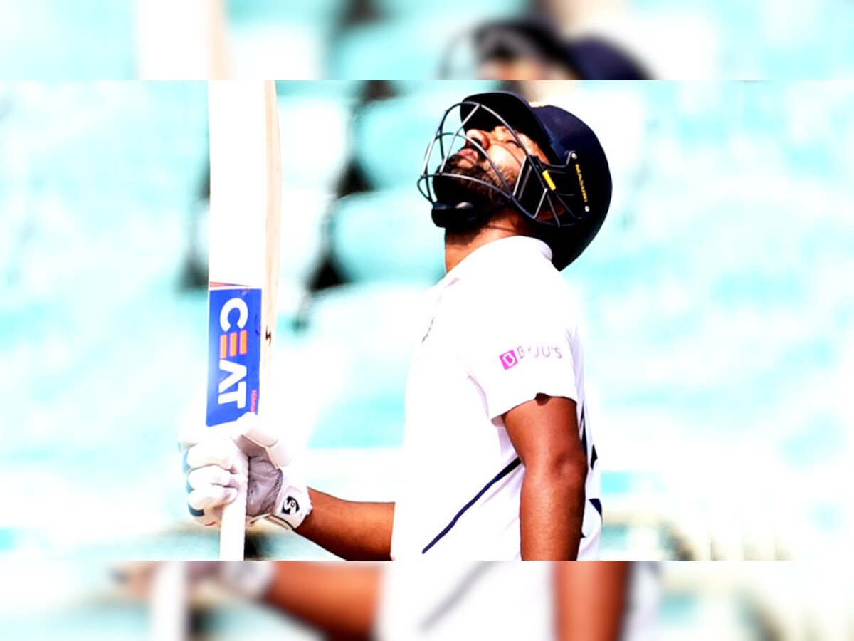 रोहित शर्मा ने विशाखापत्तनम टेस्ट मैच से पहले सिर्फ तीन शतक जमाए थे. अब उन्होंने एक ही मैच में दो शतक ठोक दिए हैं. (फोटो: ANI) 