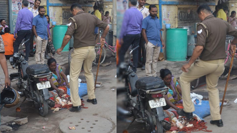 सड़क किनारे पूजा का सामान बेच रही थी महिला, सिपाही ने जूते से रौंद दी मालाएं