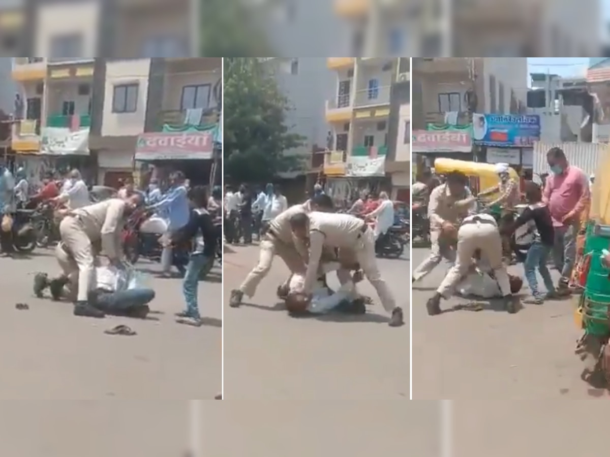 मास्क न पहनने पर पुलिस ने शख्स का बीच सड़क में किया बुरा हाल, हैरान कर देगा VIDEO