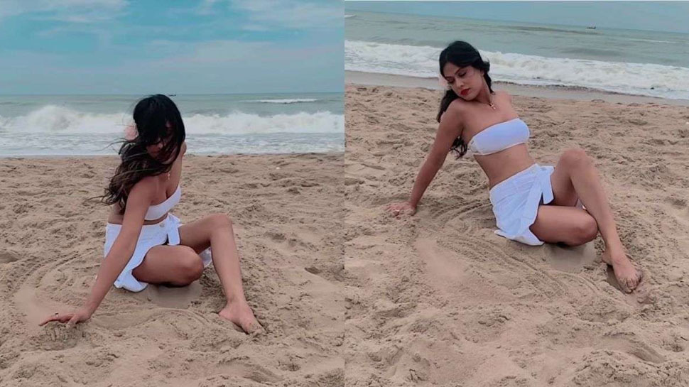 हॉट अंदाज में रेत पर खेलती दिखीं Nia Sharma, VIDEO ने मचाया तहलका