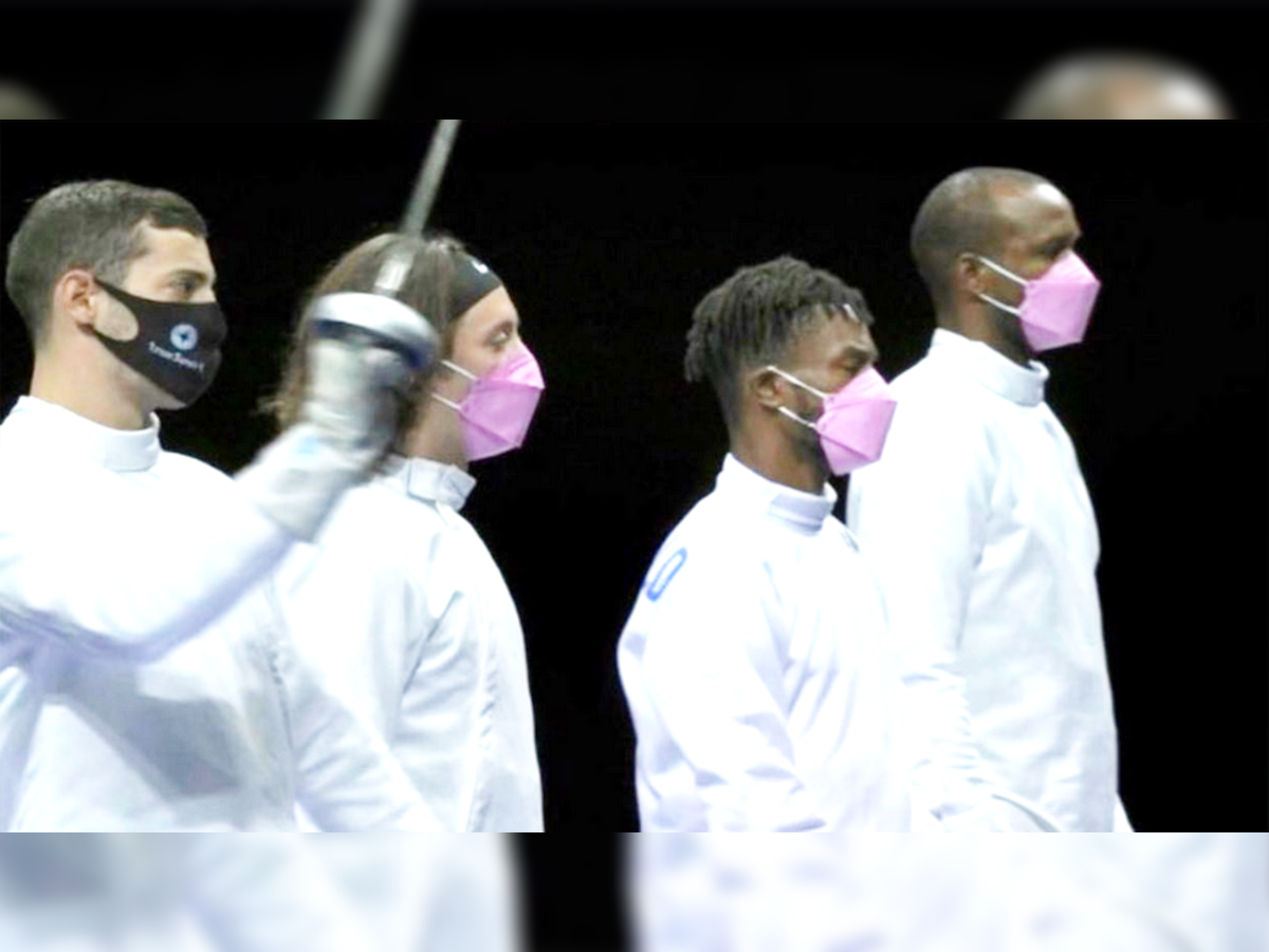American fencers wear pink masks in protest