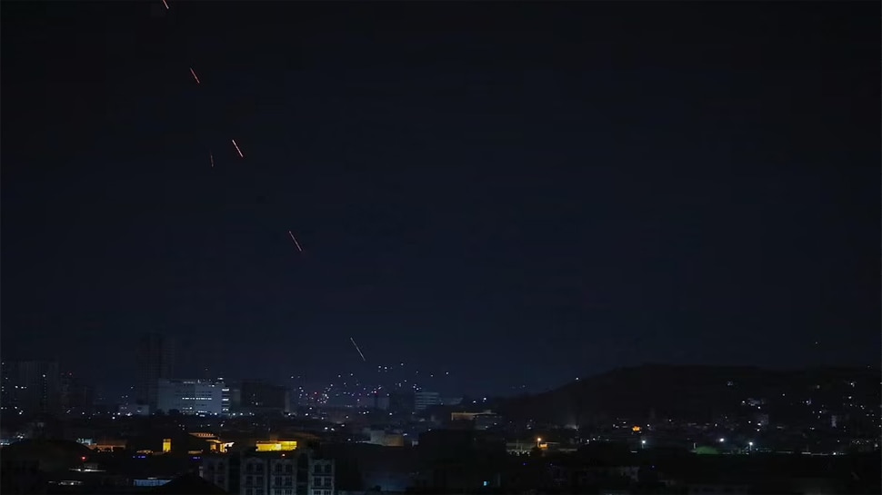 Taliban gunmen lit up the night sky over Kabul 