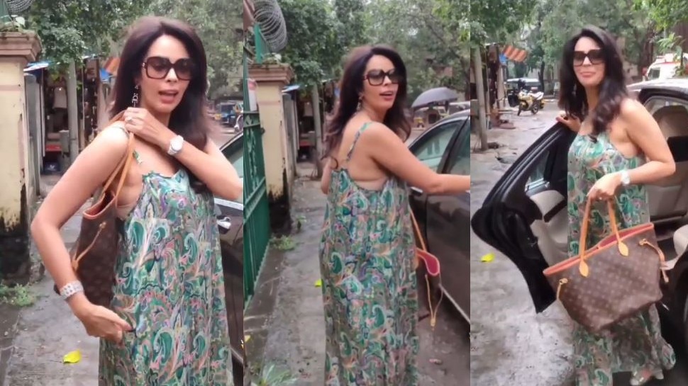 Mallika Sherawat ने पहनी इतनी खुली-डुली ड्रेस, पर्स से छिपाती आईं नजर