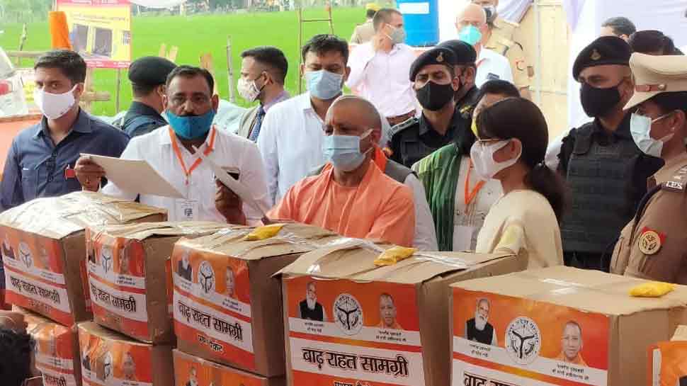 CM योगी आदित्यानाथ ने लिखा, ''न हो निराश, दौड़ेगी जीवन की गाड़ी, जब हम हैं साथ, क्या बाढ़-क्या महामारी''