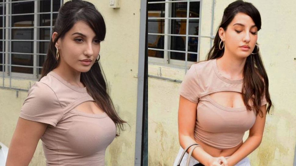 In pics: Nora Fatehi matches her nude colour crop top with a Louis