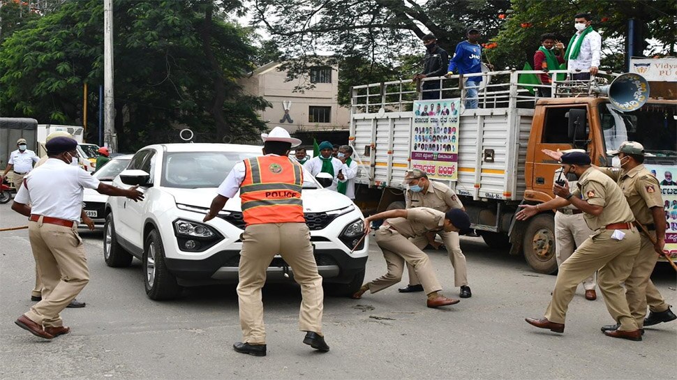 किसान नेता ने DCP के पैर पर चढ़ाई SUV कार! पुलिसकर्मियों ने इस तरह बचाया