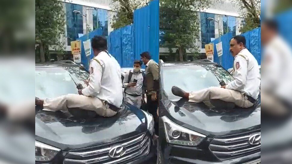 कार के बोनट पर बैठा ट्रैफिक पुलिस हवलदार, ड्राइवर ने दौड़ा दी कार, देखिए VIDEO