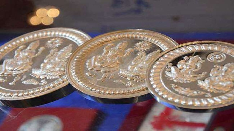 Statue or coin of Lakshmi-Ganesh ji