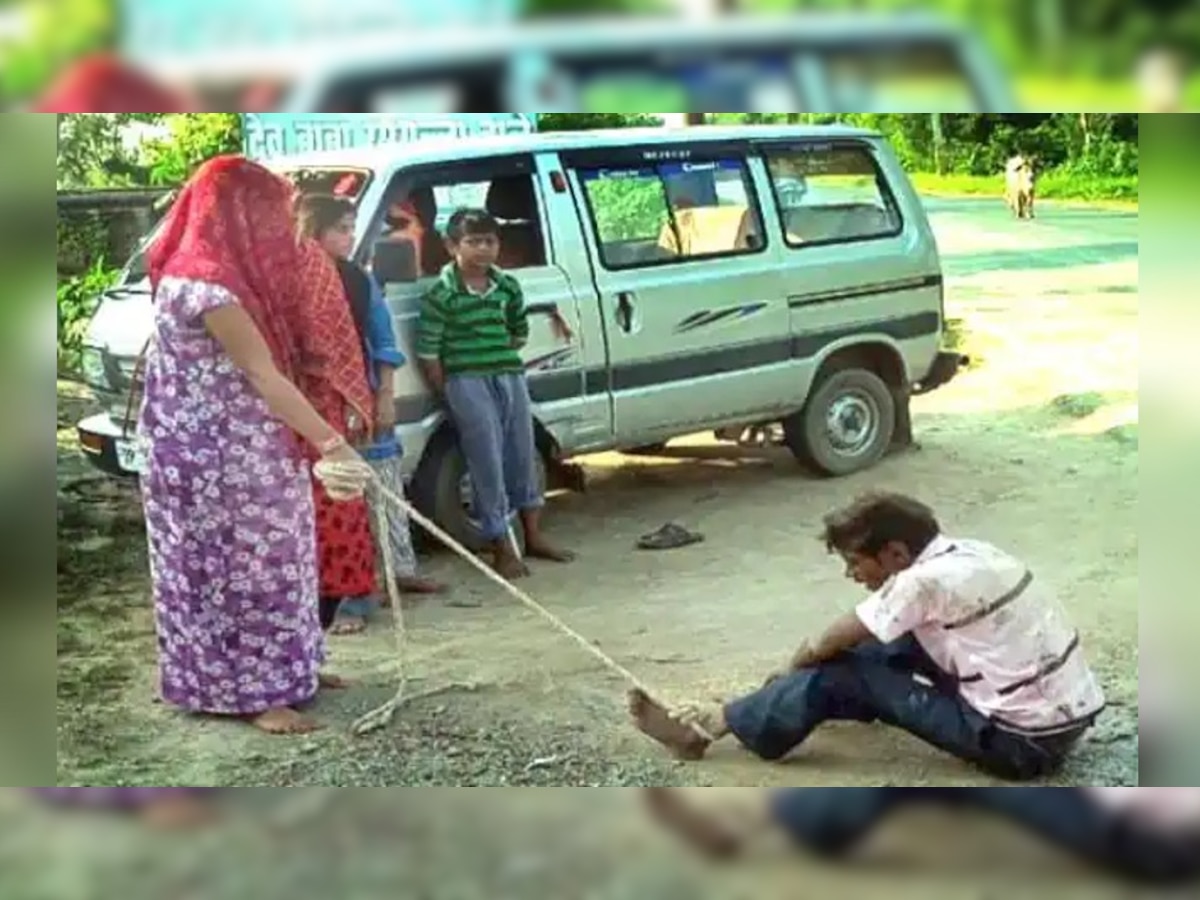 पति की पिटाई करती महिला. 