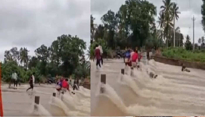 Video: देखते ही देखते पानी की तेज धार में बहने लगे बाइक सवार, देखें फिर क्या हुआ