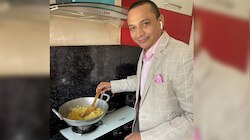 IAS ने सूट-बूट में बनाया पोहा, फोटो शेयर किया तो लोगों ने पकड़ ली ये 'बड़ी गलती'