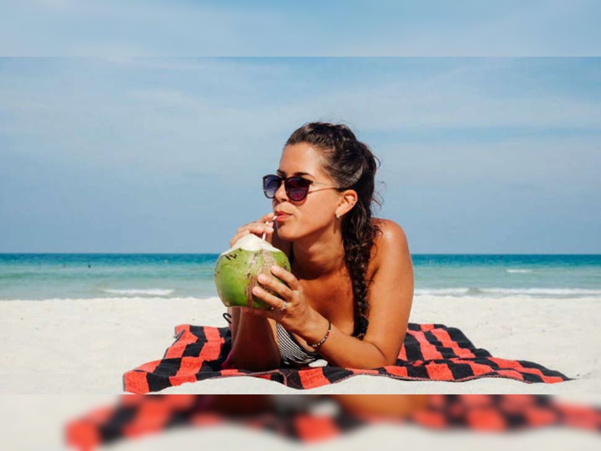 Coconut Water: गर्मियों में नारियल पानी पीना क्यों है फायदेमंद ? जानिए इसके 4 बड़े फायदे