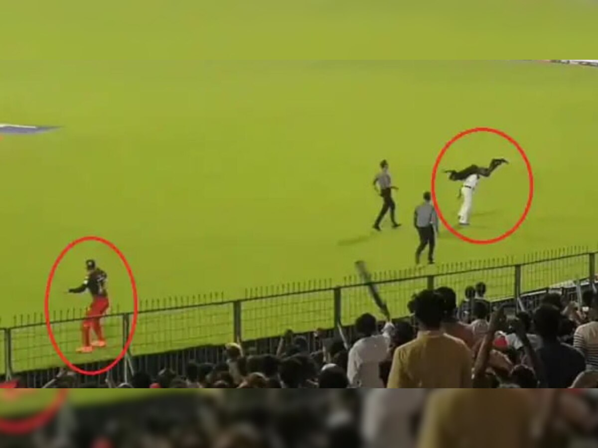 Watch: Live मैच में विराट कोहली से मिलने मैदान में कूदा शख्स, कंधे पर टांग कर ले गई पुलिस