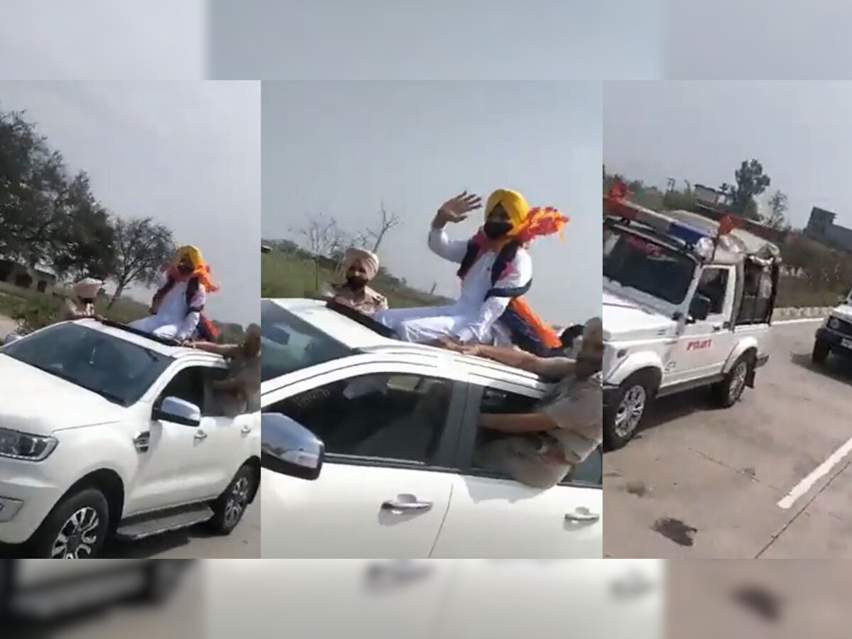 Punjab Minister: मंत्री जी के ठाठ! गाड़ी की सनरूफ पर बैठे, साइड से लटके गार्ड; देखें वीडियो
