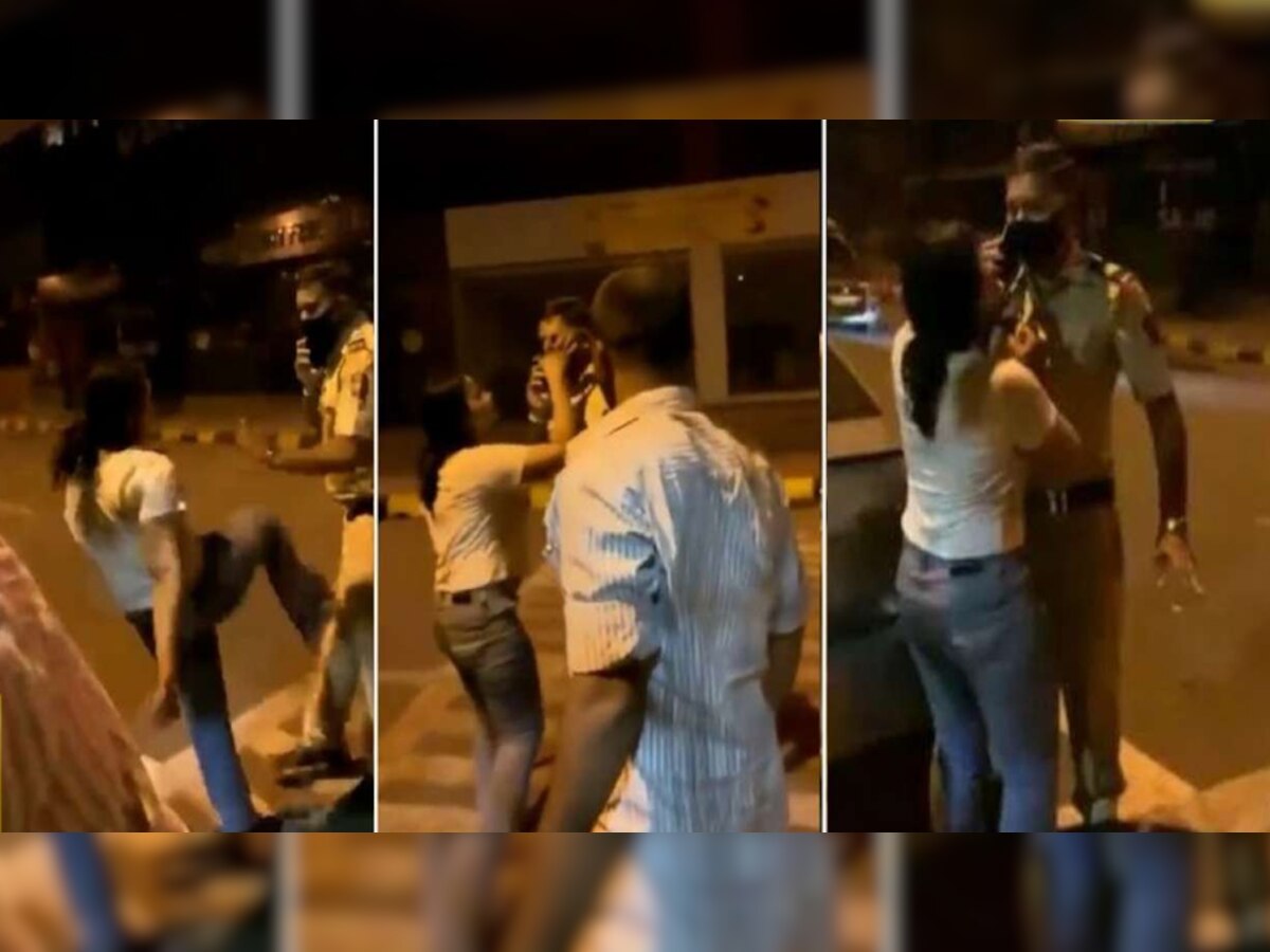 VIRAL VIDEO: नशे में धुत युवती का हाई वोल्टेज ड्रामा, पुलिस अधिकारी को मारी लात; पकड़ लिया कॉलर