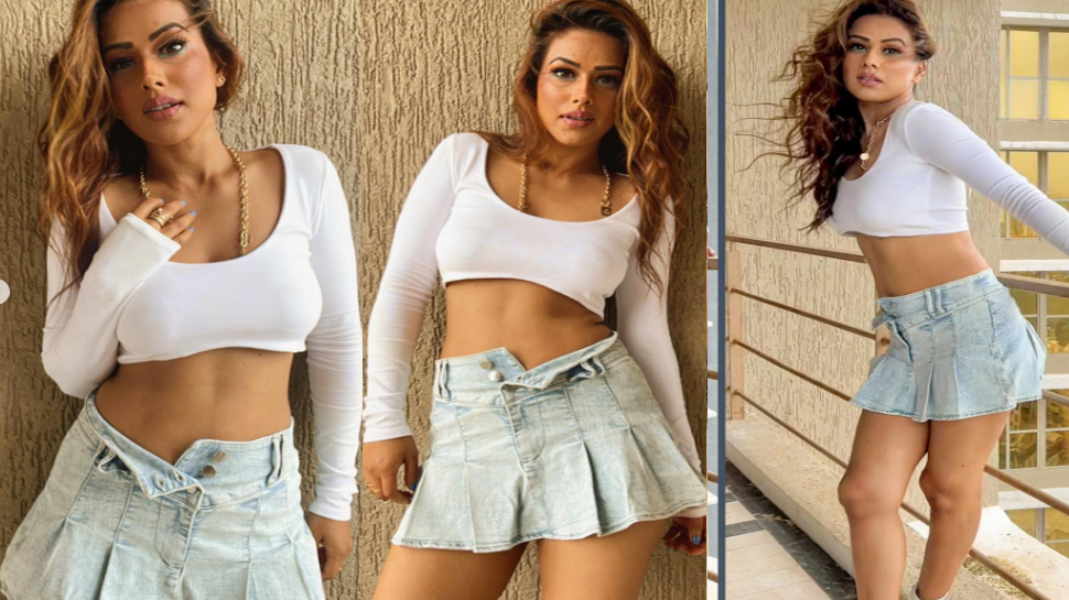 Nia Sharma ने तेज हवा के बीच खोल दिया स्कर्ट का बटन; लोग बोले... Nia Sharma ने तेज हवा के बीच खोल दिया स्कर्ट का बटन; लोग बोले...