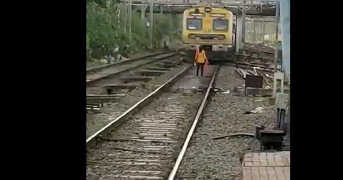 Train Viral Video Woman jumps in front of local train for suicide what
