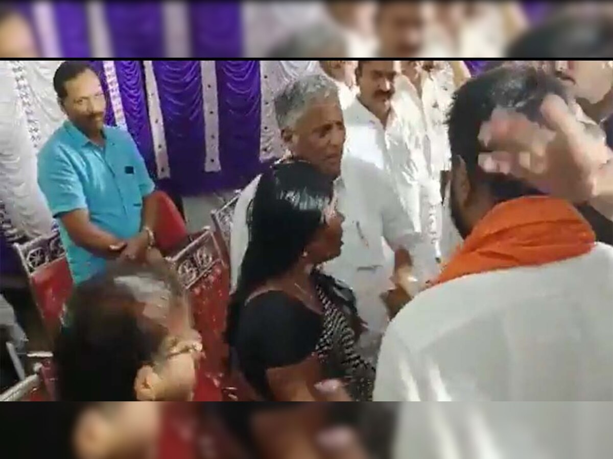Minister slaps women 