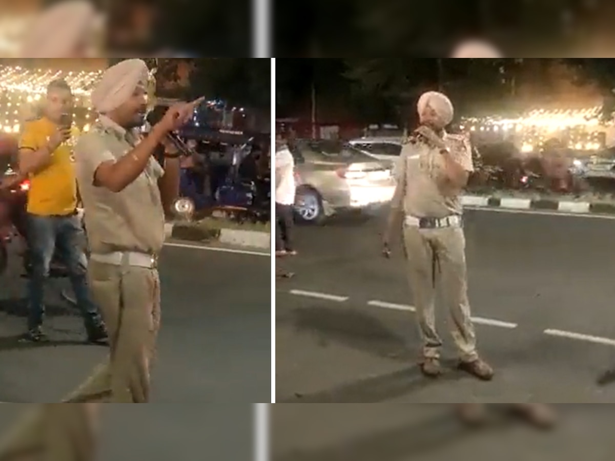 बीच सड़क पर खड़े होकर 'दलेर मेहंदी' का गाना गाने लगा पुलिसकर्मी, Video में बोल सुनकर हंस पड़ेंगे आप