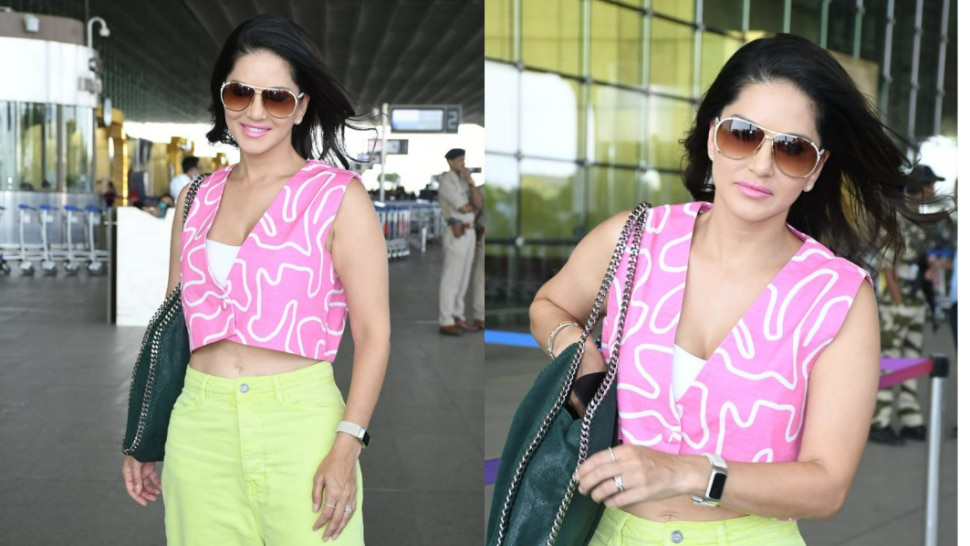 Sunny Leone Spotted on airport in the most casual look reacts to camera photos viral on social media | Sunny Leone Look: बिंदास अंदाज में एयरपोर्ट पर निकलीं सनी लियोनी, कैमरा देखकर