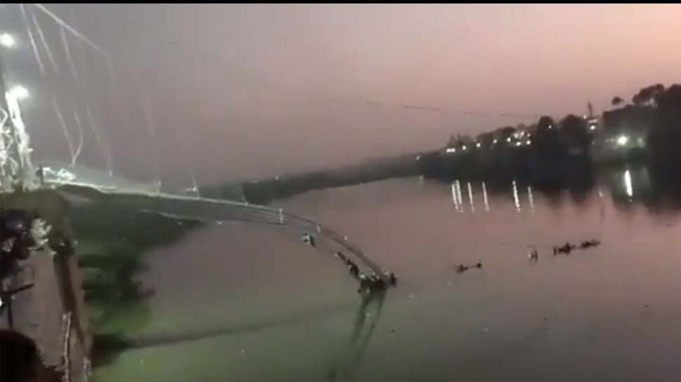 Gujarat Suspension bridge collapses in Morbi several fall into Machchu