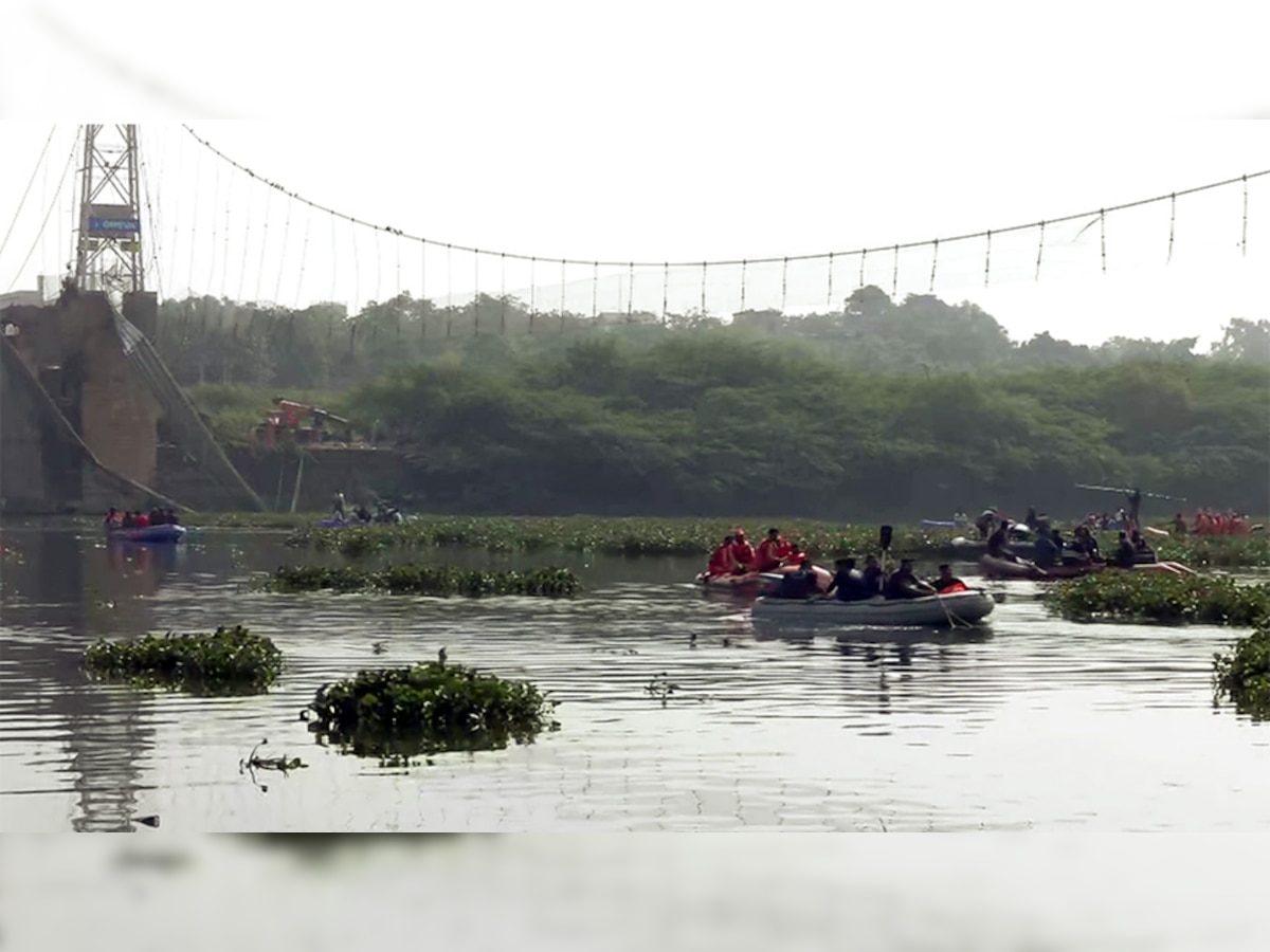 Morbi Bridge Collapse: भगवान की कृपा नहीं होने से हुआ हादसा, ओरेवा कंपनी ने कोर्ट में दिया अजीब तर्क