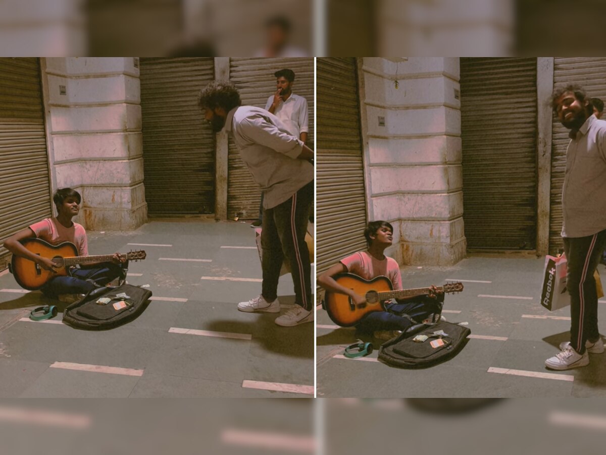 Watch: सड़क किनारे गिटार लेकर बैठे लड़के ने सुरीली आवाज में गाया ये पंजाबी सॉन्ग, अनजान शख्स ने किया ऐसा