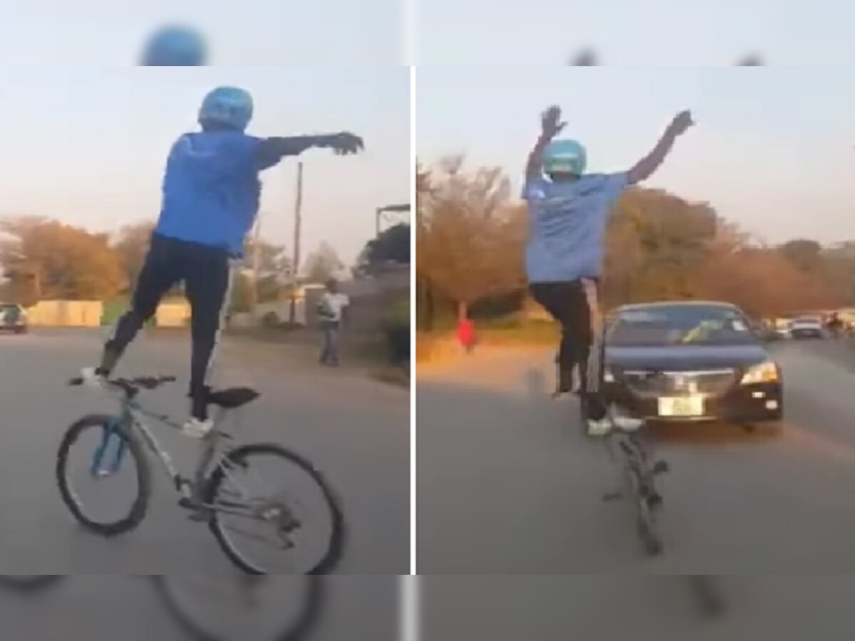 Cycle Stunt: चलती साइकिल की हैंडल पर खड़ा होकर नाचने लगा, रोड पर दिखाए खतरनाक स्टंट
