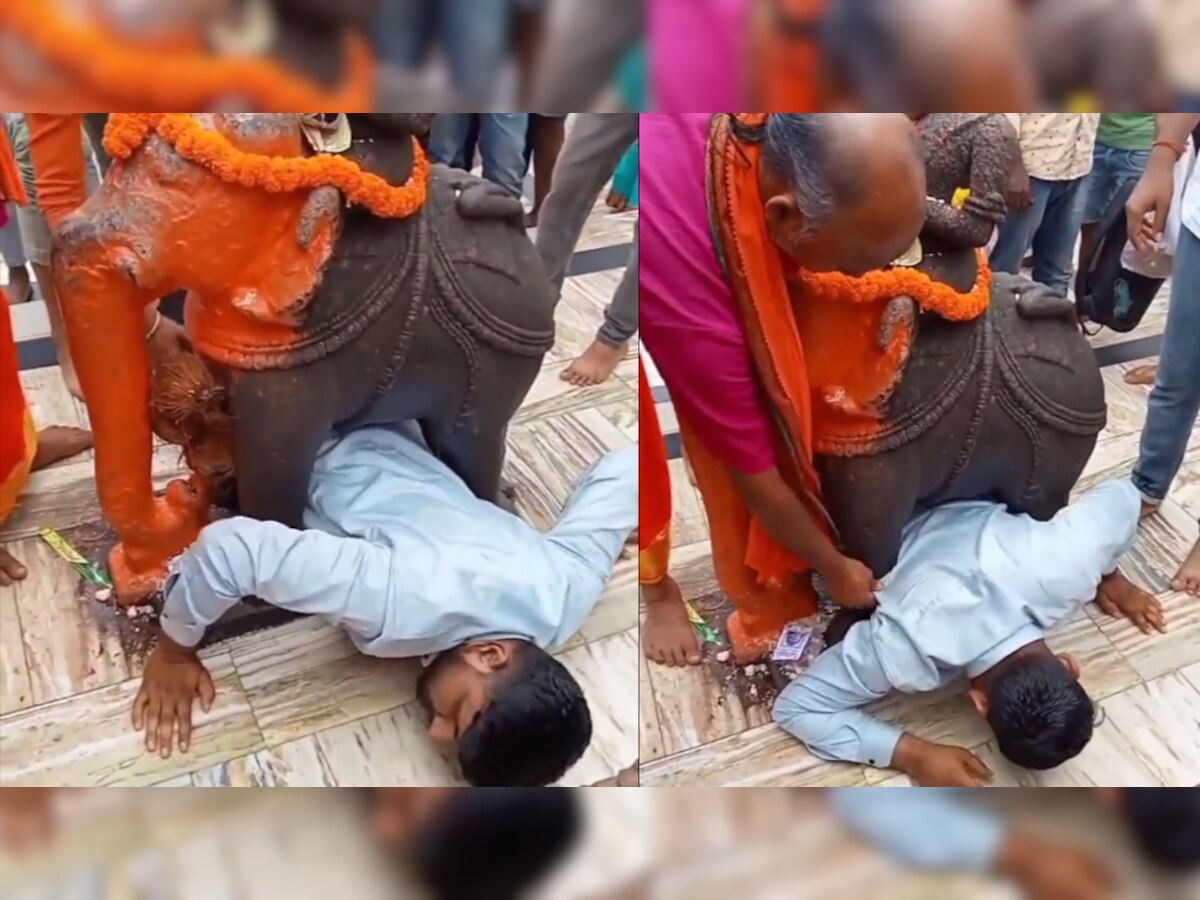 मंदिर में दर्शन करने पहुंचा शख्स मूर्ति के बीच फंसा, Video देखकर लोग बोले- इतनी भी भक्ति न दिखाओ कि...