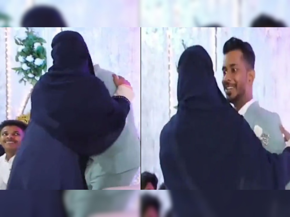 Viral Video: स्टेज पर रिश्तेदारों के सामने दूल्हे से लिपट गई 'बुर्के वाली महिला', दुल्हन की हंस-हंसकर हालत खराब