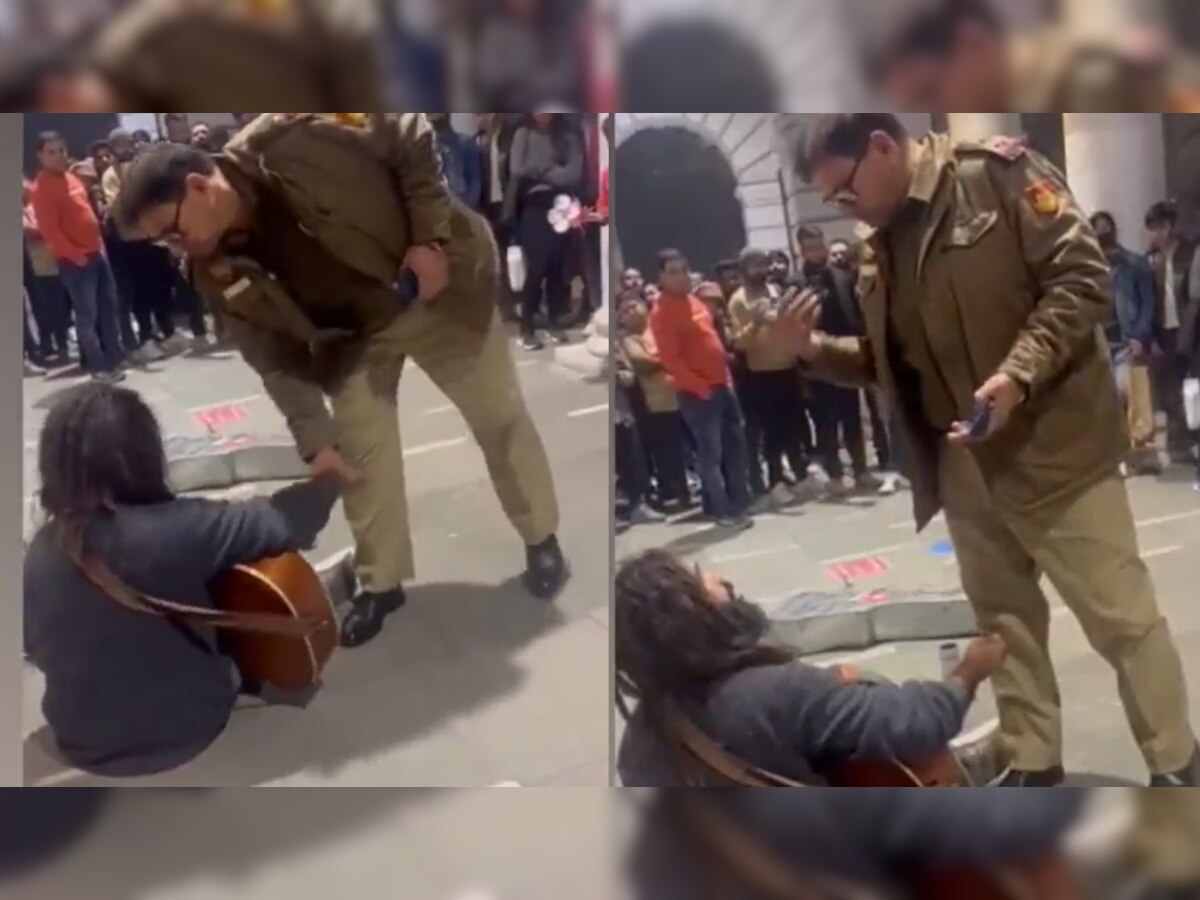 सड़क किनारे गिटार बजा रहे शख्स को पुलिसवाले ने रोका, Video देखकर लोगों को आया गुस्सा; दिए ऐसे रिएक्शन