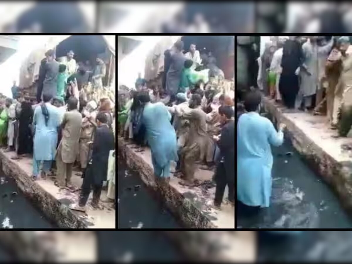 पाकिस्तान में आटा पाने की लगी होड़, अनाज लूटने के चक्कर में नाले में गिरे लोग, देखें VIDEO